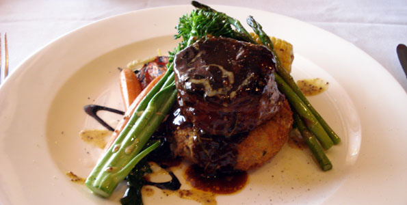 Peppered grilled elk medallion with red wine sauce