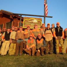 corporate group in front of lodge